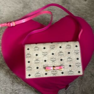 Mcm crossbody bag pink slight color on front With card and tags.